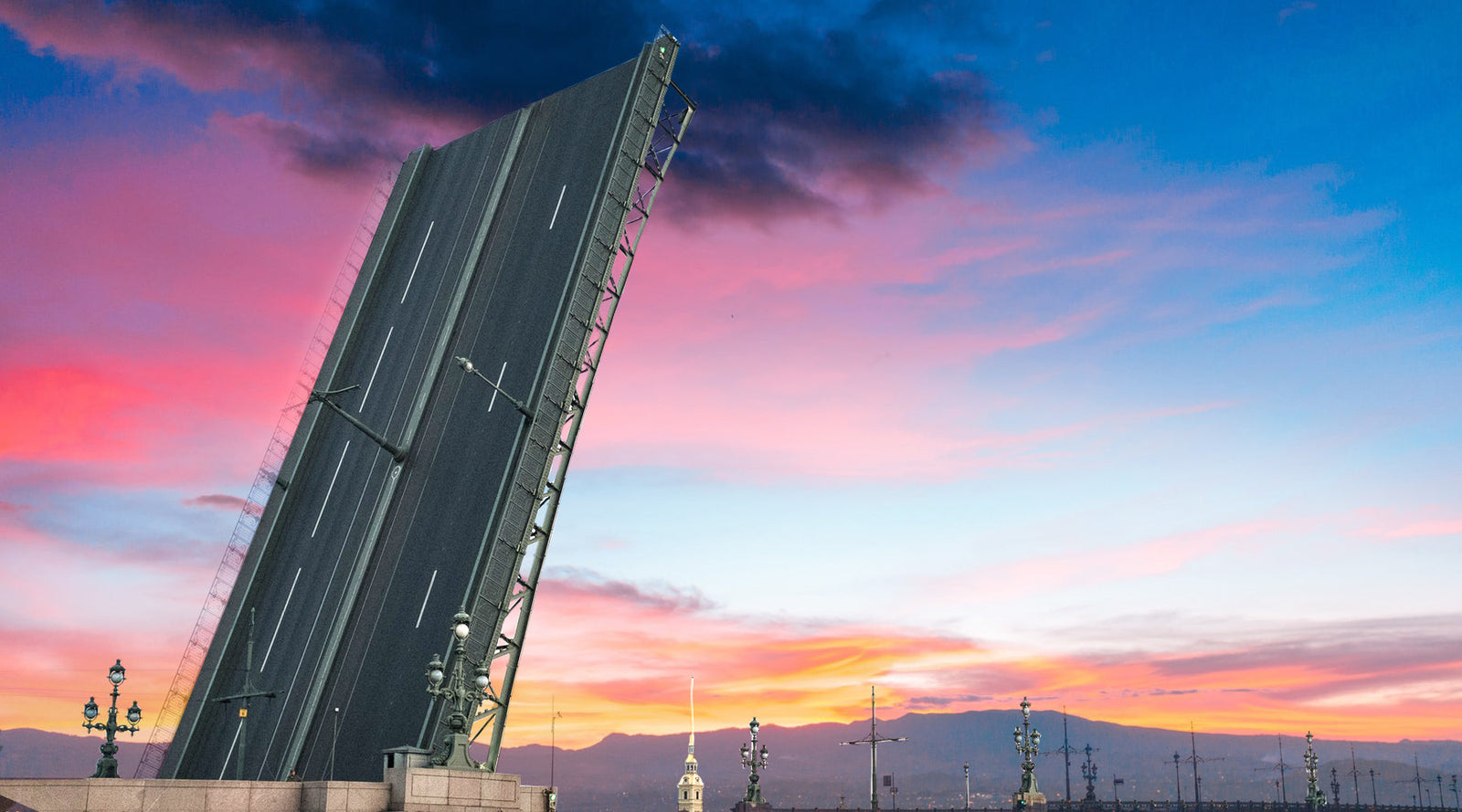 Open drawbridge during sunset that evokes a man's erection