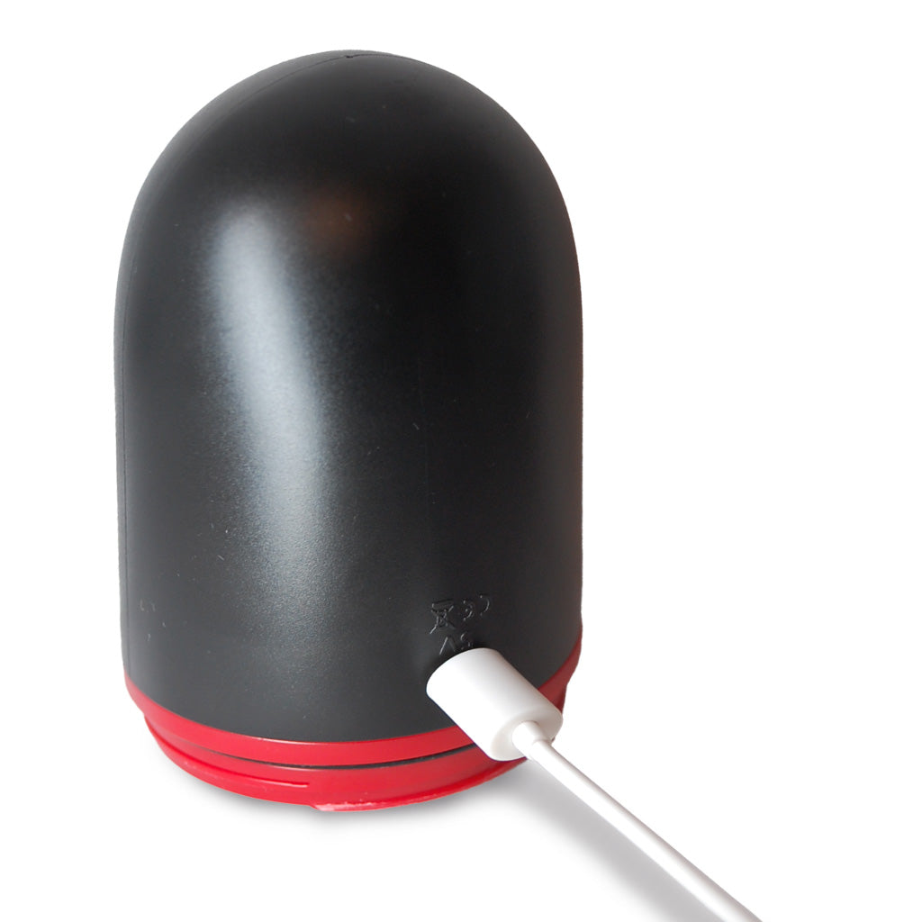 Optimus Red Light Triple-Action Erection Enhancer Charging the Pump Head